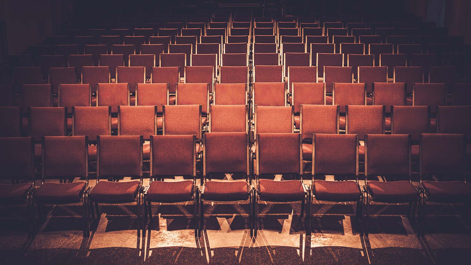 empty chairs in auditorium 