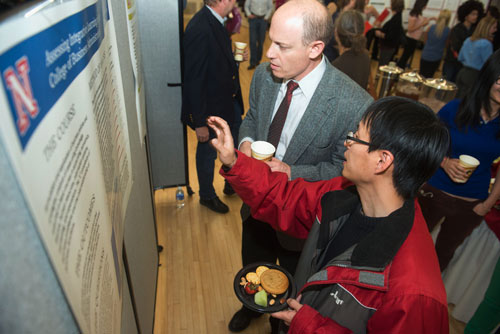 Guy Trainin presents poster of his analyses of ACE 10 Courses at the April 2014 undergraduate research conference