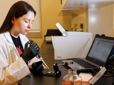  Kassandra Durazo-Martineza, a graduate student in animal science, pipettes a sample in the Flow Cytometry lab in the Morrison Center. 