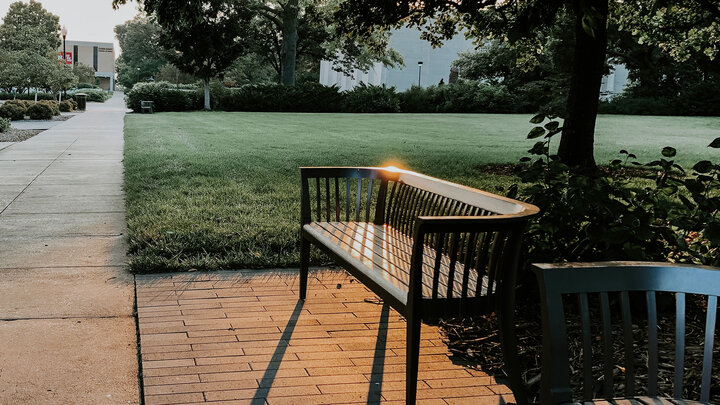 empty bench on campus