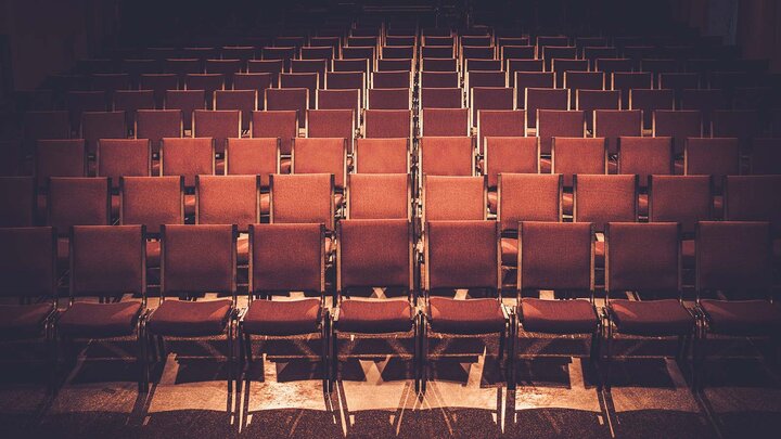 empty chairs in auditorium 