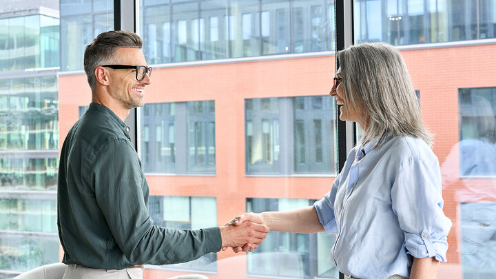 Two people shaking hands