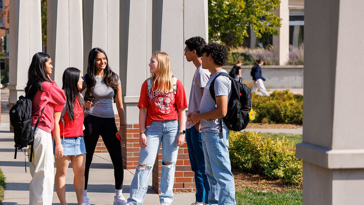 Raikes students outside building
